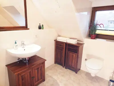 Ein Badezimmer in der Unterkunft Maisonette Ferienwohnung - Stuth Barth