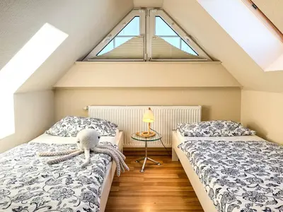 Ein Bett oder Betten in einem Zimmer der Unterkunft Schifferkaten