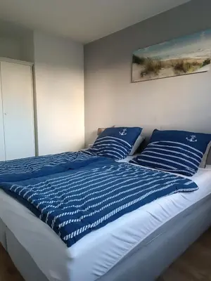 Ein Bett oder Betten in einem Zimmer der Unterkunft Osteemeerchen