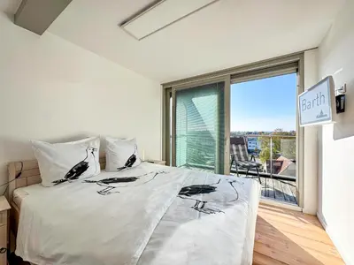 Ein Bett oder Betten in einem Zimmer der Unterkunft Speicherresidenz App 5 9 Südseite