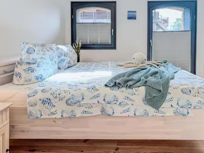 Ein Bett oder Betten in einem Zimmer der Unterkunft Speicherresidenz App 03 - Südseite