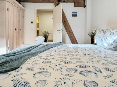 Ein Bett oder Betten in einem Zimmer der Unterkunft Speicherresidenz App 03 - Südseite