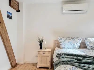 Ein Bett oder Betten in einem Zimmer der Unterkunft Speicherresidenz App 03 - Südseite