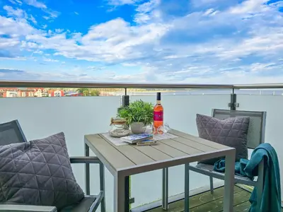 Ein Balkon oder eine Terrasse in der Unterkunft Speicherresidenz App 4 6 - Hafenblick