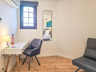 Ein Sitzbereich in der Unterkunft Speicherresidenz App 4 6 - Hafenblick