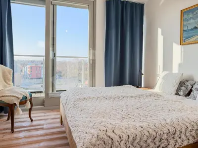 Ein Bett oder Betten in einem Zimmer der Unterkunft Speicherresidenz App 5 11 - Südseite