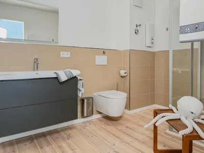 Ein Badezimmer in der Unterkunft Speicherresidenz App 5 11 - Südseite