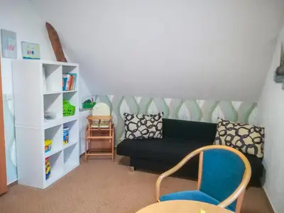 Ein Sitzbereich in der Unterkunft Ferienwohnung auf dem Lande