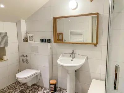 Ein Badezimmer in der Unterkunft Wattmanbruukt