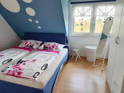 Ein Bett oder Betten in einem Zimmer der Unterkunft Haus Waldesruh