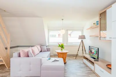 Ein Sitzbereich in der Unterkunft Ferienhaus Sanddorn, Fewo Strandflieder