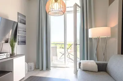 TV/Unterhaltungsangebot in der Unterkunft 5-Sterne Apartment Strandflieder mit einem traumhaften Boddenblick
