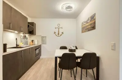 Küche/Küchenzeile in der Unterkunft 5-Sterne-Ferienwohnung Ostseeschatz Zingst inklusive Strandkorb von April - Oktober