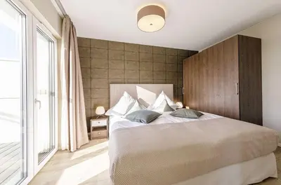 Ein Bett oder Betten in einem Zimmer der Unterkunft 5 Sterne Ferienwohnung Sommersuite mit genialer Dachterrasse