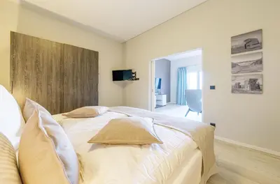 Ein Bett oder Betten in einem Zimmer der Unterkunft Moderne 5 Sterne Ferienwohnung Welleneck im malerischen Ostseebad Wustrow