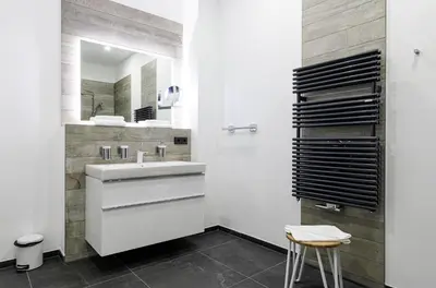 Ein Badezimmer in der Unterkunft Moderne 5 Sterne Ferienwohnung Welleneck im malerischen Ostseebad Wustrow