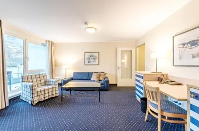 Ein Sitzbereich in der Unterkunft Küstenbrise - Charmante Ferienwohnung in Strandnähe