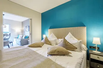 Ein Bett oder Betten in einem Zimmer der Unterkunft 5 Sterne Apartment Dünenkieker mit einer traumhaften Atmosphäre