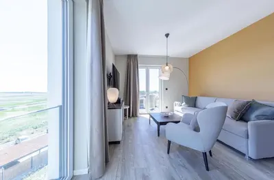 Ein Sitzbereich in der Unterkunft 5 Sterne Ferienwohnung Boddenidylle-modernes Juwel zwischen Ostsee und Bodden