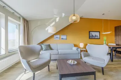 Ein Sitzbereich in der Unterkunft 5-Sterne-Ferienwohnung Dünenidylle im 3 Obergeschoss