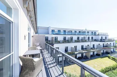 Ein Balkon oder eine Terrasse in der Unterkunft Tolle 5 Sterne Ferienwohnung Ostseequartier mit dem wunderschönem Südbalkon