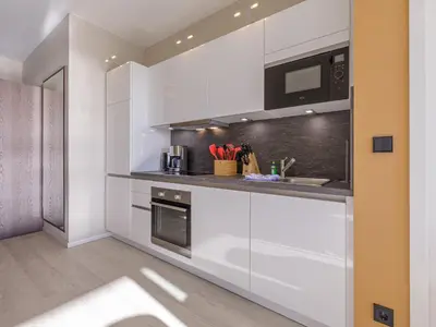 Küche/Küchenzeile in der Unterkunft Dünenlounge - 5 Sterne Ferienwohnung mit West-Balkon und fantastischem Blick über den Deich