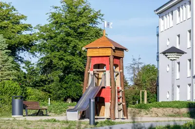 Ein Garten an der Unterkunft Dünenlounge - 5 Sterne Ferienwohnung mit West-Balkon und fantastischem Blick über den Deich