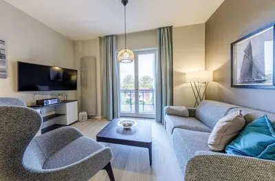 TV/Unterhaltungsangebot in der Unterkunft Boddenzeit - Moderne Ferienwohnung mit Nordbalkon, Wellnessbereich und Nähe zum Ostseestrand