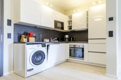 Küche/Küchenzeile in der Unterkunft Lüttstuv - Stilvolle Ferienwohnung in historischer Seefahrtschule mit Ostseeflair