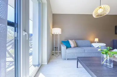 Ein Sitzbereich in der Unterkunft Swantovit - 5 Sterne Ferienwohnung zwischen Ostsee und Saaler Bodde