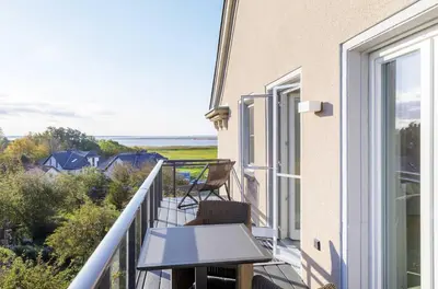 Ein Balkon oder eine Terrasse in der Unterkunft Sonnenaufgang - Charmante Ferienwohnung für Paare und Familien zwischen Ostsee und Bodden