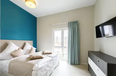 Ein Bett oder Betten in einem Zimmer der Unterkunft Boddentraum - 5 Sterne Ferienwohnung mit Blick auf das malerische Ostseebad Wustrow