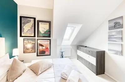 Ein Bett oder Betten in einem Zimmer der Unterkunft Seebadbrise - Traumhafte Ausblicke und maritimes Flair im Herzen von Wustrow