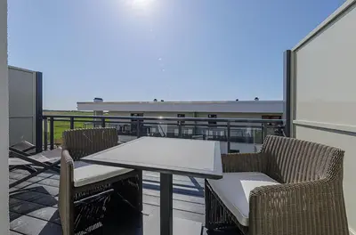 Ein Balkon oder eine Terrasse in der Unterkunft Ostseedomizil - 5 Sterne Ferienwohnung Ihr Rückzugsort zwischen Ostsee und Bodden