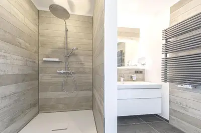 Ein Badezimmer in der Unterkunft Seebadperle - 5 Sterne Ferienwohnung - Exklusives Ambiente zwischen Ostsee und Bodden