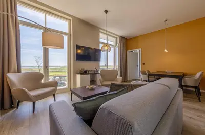 TV/Unterhaltungsangebot in der Unterkunft Wellenreiter - 5-Sterne Ferienwohnung mit Südbalkon und Boddenblick