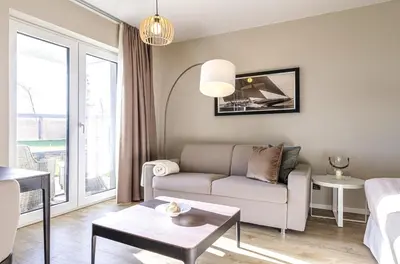 Ein Sitzbereich in der Unterkunft Ferienapartment Kleiner Strandkorb - Ihr Rückzugsort zwischen Ostsee und Bodden