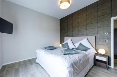 Ein Bett oder Betten in einem Zimmer der Unterkunft Störtebeker Suite 5-Sterne-Urlaub an der Ostsee