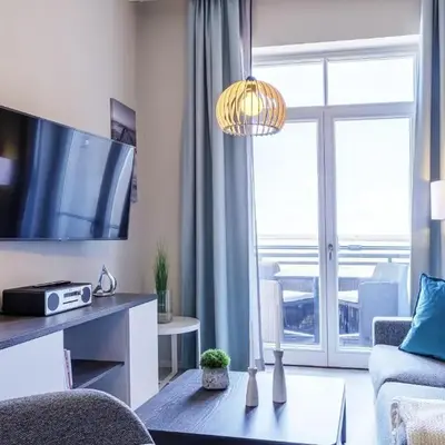 Ostseestern - 5-Sterne Ferienwohnung mit Südbalkon am Bodden
