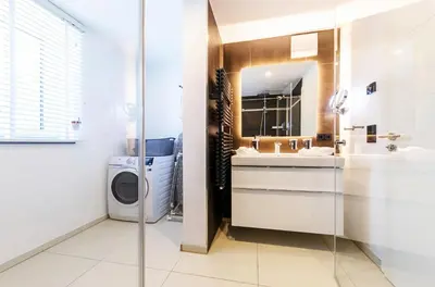 Ein Badezimmer in der Unterkunft Große Strandoase 5 Sterne Ferienwohnung mit Blick auf den Bodden