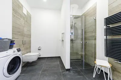 Ein Badezimmer in der Unterkunft Sandwelle 5 Sterne Apartment mit Boddenblick