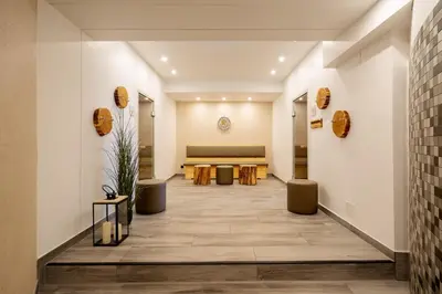 Ein Sitzbereich in der Unterkunft Moderne 5 Sterne Ferienwohnung Strandlilie