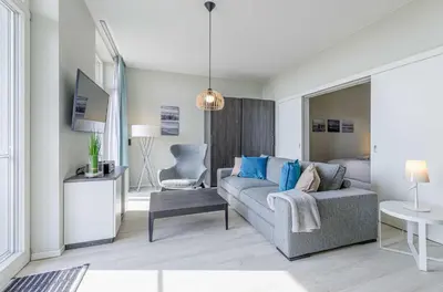 Ein Sitzbereich in der Unterkunft 5-Sterne-Ferienwohnung Windröschen im Ostseebad