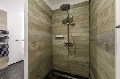 Ein Badezimmer in der Unterkunft 5 Sterne Ferienwohnung Lütt Matten in der Seefahrtsschule