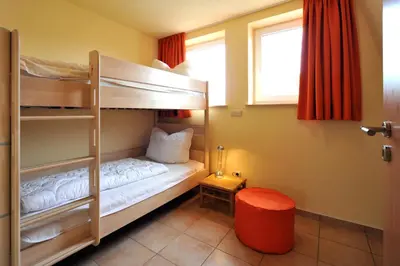 Ein Bett oder Betten in einem Zimmer der Unterkunft Hus Utblick 8B