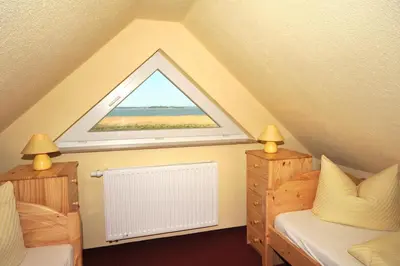 Ein Bett oder Betten in einem Zimmer der Unterkunft Hus Utblick 8B
