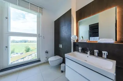 Ein Badezimmer in der Unterkunft Ostseepanorama - mit Balkon und Boddenblick