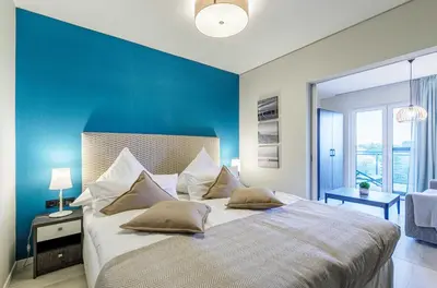 Ein Bett oder Betten in einem Zimmer der Unterkunft Sommerzeit- 3 Zimmer-Wohnung mit 5 Sternen