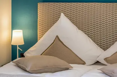 Ein Bett oder Betten in einem Zimmer der Unterkunft Lüttkoje - Ferienwohnung mit zwei Schlafzimmern