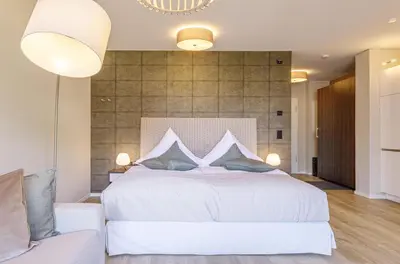Ein Bett oder Betten in einem Zimmer der Unterkunft Kleine Stranddüne im Strandhaus mit Balkon